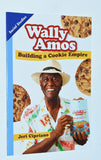 Book cover reads 'Wally Amos: Building a Cookie Empire' by Jeri Cipriano with Amos holding a cookie package.