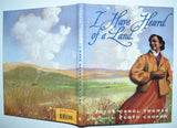 I Have Heard of a Land (1998) by Joyce Carol Thomas and Floyd Cooper (illustrations)