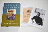 ROCKING THE BABIES by Linda Raymond (1994) REVIEW COPY / 1st Edition / Hardcover